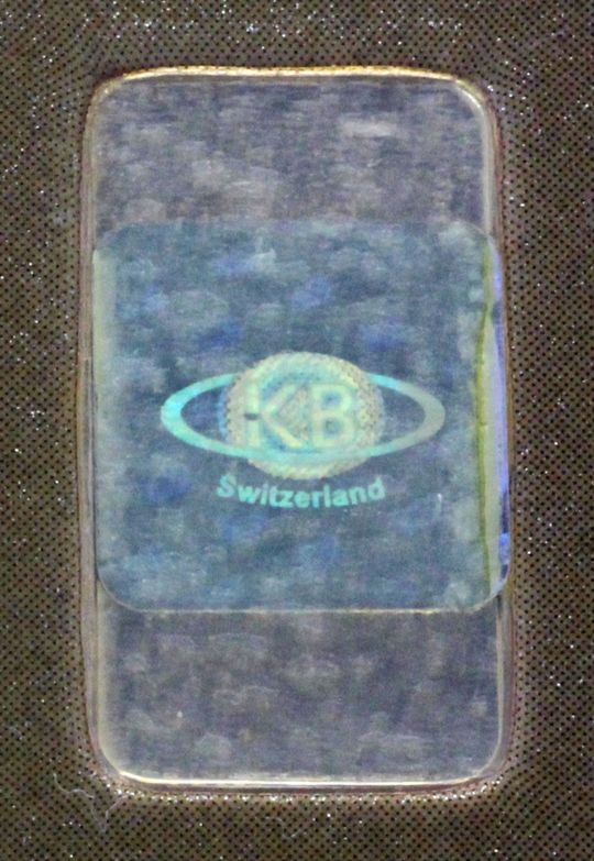 Hologrammaufkleber auf KB 1g Goldbarren